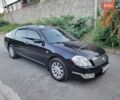 Черный Ниссан Теана, объемом двигателя 2.4 л и пробегом 245 тыс. км за 5500 $, фото 2 на Automoto.ua
