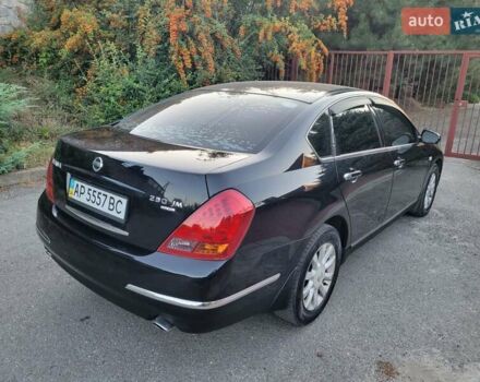 Черный Ниссан Теана, объемом двигателя 2.4 л и пробегом 245 тыс. км за 5500 $, фото 3 на Automoto.ua