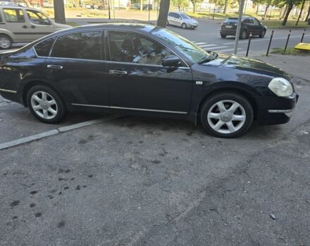 Черный Ниссан Теана, объемом двигателя 3.5 л и пробегом 301 тыс. км за 6900 $, фото 2 на Automoto.ua