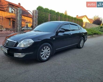 Черный Ниссан Теана, объемом двигателя 2.4 л и пробегом 245 тыс. км за 5500 $, фото 1 на Automoto.ua