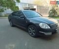 Черный Ниссан Теана, объемом двигателя 3.5 л и пробегом 385 тыс. км за 5500 $, фото 1 на Automoto.ua