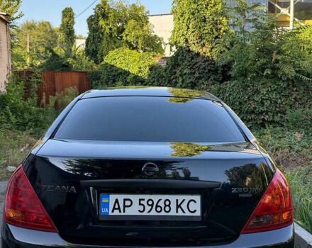 Черный Ниссан Теана, объемом двигателя 2.3 л и пробегом 225 тыс. км за 5500 $, фото 1 на Automoto.ua