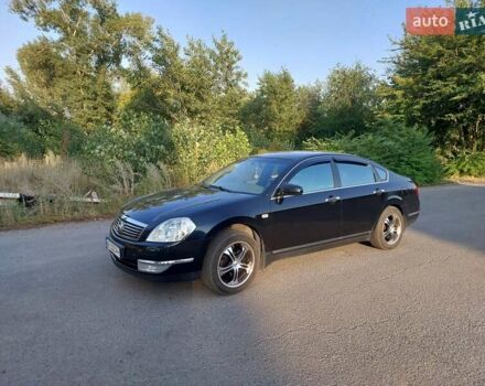 Черный Ниссан Теана, объемом двигателя 2.35 л и пробегом 159 тыс. км за 7500 $, фото 14 на Automoto.ua