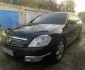 Черный Ниссан Теана, объемом двигателя 3.5 л и пробегом 237 тыс. км за 5650 $, фото 1 на Automoto.ua