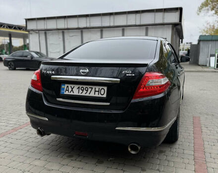Черный Ниссан Теана, объемом двигателя 2.5 л и пробегом 246 тыс. км за 6100 $, фото 4 на Automoto.ua