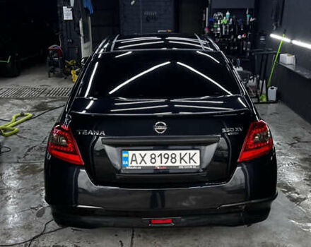Черный Ниссан Теана, объемом двигателя 3.5 л и пробегом 215 тыс. км за 7700 $, фото 1 на Automoto.ua