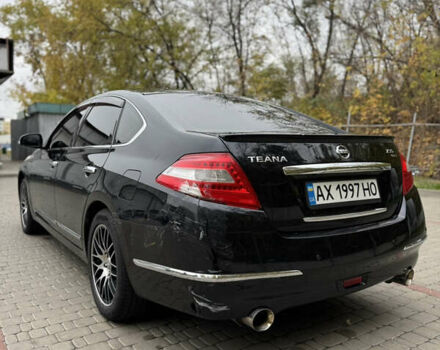 Черный Ниссан Теана, объемом двигателя 2.5 л и пробегом 246 тыс. км за 6100 $, фото 5 на Automoto.ua