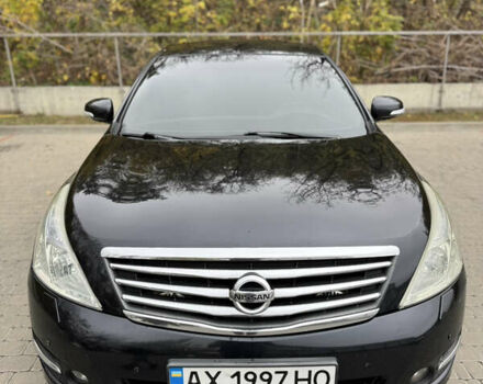 Черный Ниссан Теана, объемом двигателя 2.5 л и пробегом 246 тыс. км за 6100 $, фото 1 на Automoto.ua