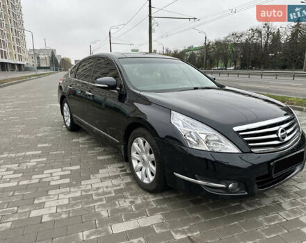 Черный Ниссан Теана, объемом двигателя 3.5 л и пробегом 255 тыс. км за 8000 $, фото 1 на Automoto.ua
