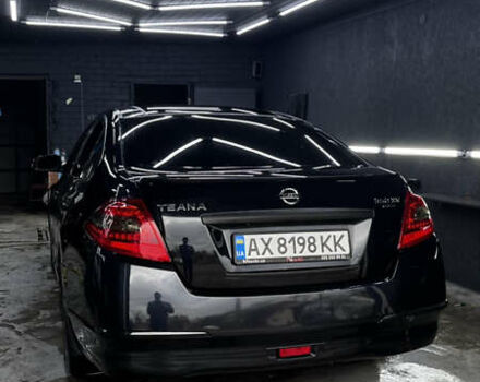 Черный Ниссан Теана, объемом двигателя 3.5 л и пробегом 215 тыс. км за 7700 $, фото 2 на Automoto.ua