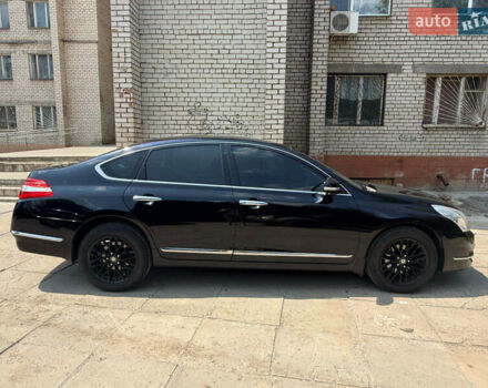 Черный Ниссан Теана, объемом двигателя 2.5 л и пробегом 256 тыс. км за 8200 $, фото 2 на Automoto.ua