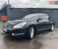 Черный Ниссан Теана, объемом двигателя 2.5 л и пробегом 285 тыс. км за 6700 $, фото 1 на Automoto.ua