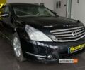 Черный Ниссан Теана, объемом двигателя 2.5 л и пробегом 268 тыс. км за 6500 $, фото 1 на Automoto.ua
