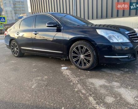 Черный Ниссан Теана, объемом двигателя 2.5 л и пробегом 240 тыс. км за 7700 $, фото 1 на Automoto.ua
