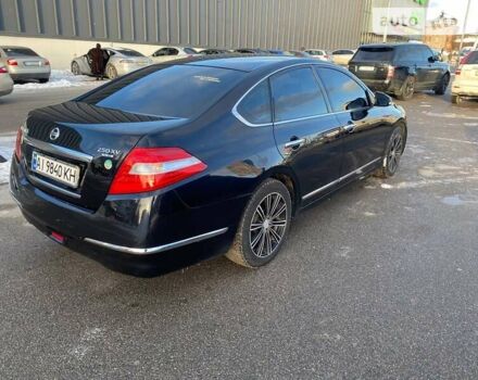 Черный Ниссан Теана, объемом двигателя 2.5 л и пробегом 240 тыс. км за 7700 $, фото 2 на Automoto.ua
