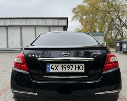 Черный Ниссан Теана, объемом двигателя 2.5 л и пробегом 246 тыс. км за 6100 $, фото 3 на Automoto.ua