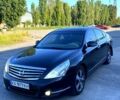 Черный Ниссан Теана, объемом двигателя 3.5 л и пробегом 350 тыс. км за 5900 $, фото 1 на Automoto.ua