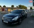 Черный Ниссан Теана, объемом двигателя 2.5 л и пробегом 286 тыс. км за 7400 $, фото 1 на Automoto.ua