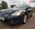 Черный Ниссан Теана, объемом двигателя 2.5 л и пробегом 302 тыс. км за 7250 $, фото 1 на Automoto.ua