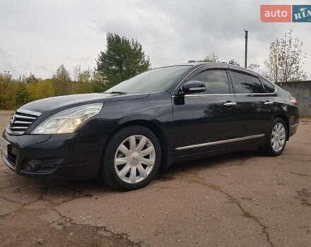 Черный Ниссан Теана, объемом двигателя 2.5 л и пробегом 302 тыс. км за 7250 $, фото 1 на Automoto.ua