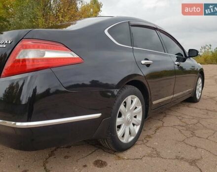 Черный Ниссан Теана, объемом двигателя 2.5 л и пробегом 302 тыс. км за 7250 $, фото 8 на Automoto.ua