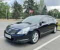 Черный Ниссан Теана, объемом двигателя 3.5 л и пробегом 235 тыс. км за 7999 $, фото 1 на Automoto.ua