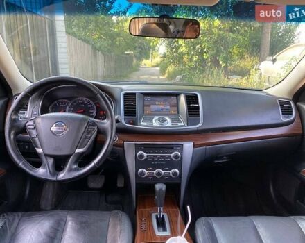 Чорний Ніссан Теана, об'ємом двигуна 2.5 л та пробігом 233 тис. км за 8890 $, фото 14 на Automoto.ua