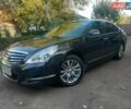 Чорний Ніссан Теана, об'ємом двигуна 2.5 л та пробігом 201 тис. км за 7950 $, фото 1 на Automoto.ua