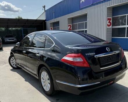 Черный Ниссан Теана, объемом двигателя 2.5 л и пробегом 100 тыс. км за 11700 $, фото 1 на Automoto.ua
