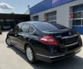 Черный Ниссан Теана, объемом двигателя 2.5 л и пробегом 100 тыс. км за 11700 $, фото 1 на Automoto.ua