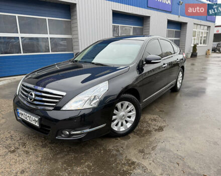Черный Ниссан Теана, объемом двигателя 2.5 л и пробегом 99 тыс. км за 10700 $, фото 1 на Automoto.ua