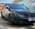 Черный Ниссан Теана, объемом двигателя 2.5 л и пробегом 200 тыс. км за 9850 $, фото 1 на Automoto.ua
