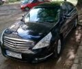 Черный Ниссан Теана, объемом двигателя 2.5 л и пробегом 140 тыс. км за 10800 $, фото 1 на Automoto.ua