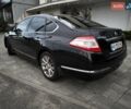 Черный Ниссан Теана, объемом двигателя 2.5 л и пробегом 200 тыс. км за 7700 $, фото 1 на Automoto.ua