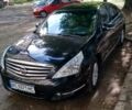 Черный Ниссан Теана, объемом двигателя 2.5 л и пробегом 141 тыс. км за 10800 $, фото 1 на Automoto.ua