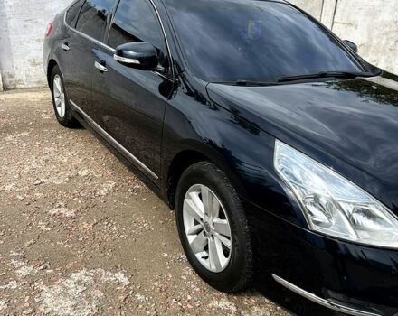 Черный Ниссан Теана, объемом двигателя 2.5 л и пробегом 194 тыс. км за 8500 $, фото 1 на Automoto.ua