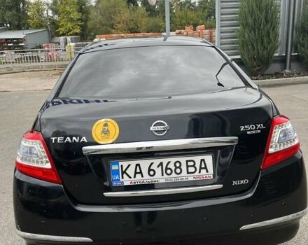 Чорний Ніссан Теана, об'ємом двигуна 2.5 л та пробігом 90 тис. км за 9000 $, фото 2 на Automoto.ua