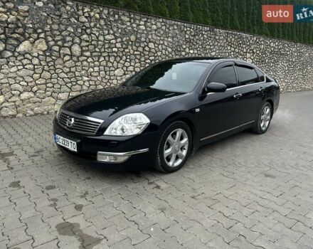 Черный Ниссан Теана, объемом двигателя 3.5 л и пробегом 280 тыс. км за 4150 $, фото 1 на Automoto.ua