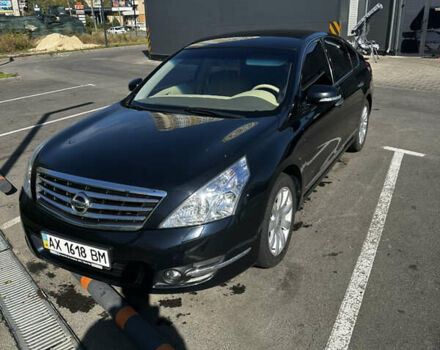 Черный Ниссан Теана, объемом двигателя 2.5 л и пробегом 71 тыс. км за 10000 $, фото 1 на Automoto.ua