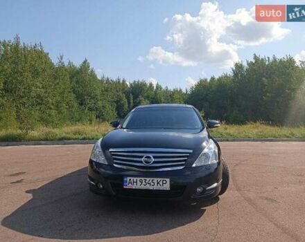 Черный Ниссан Теана, объемом двигателя 3.5 л и пробегом 186 тыс. км за 11129 $, фото 1 на Automoto.ua