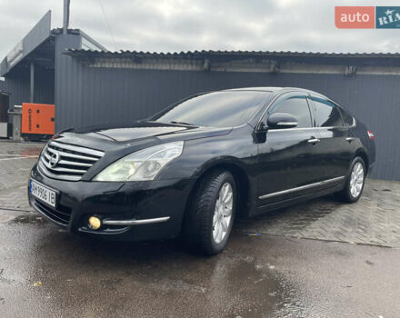 Черный Ниссан Теана, объемом двигателя 2.5 л и пробегом 285 тыс. км за 6700 $, фото 1 на Automoto.ua