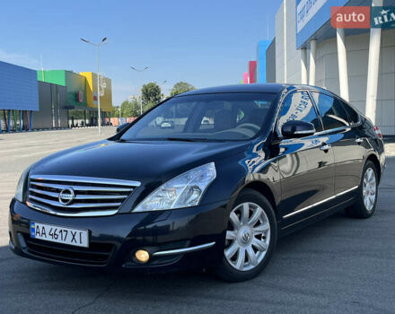 Черный Ниссан Теана, объемом двигателя 2.5 л и пробегом 185 тыс. км за 7650 $, фото 1 на Automoto.ua