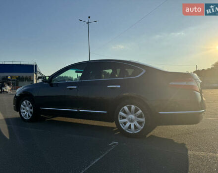 Черный Ниссан Теана, объемом двигателя 2.5 л и пробегом 182 тыс. км за 8500 $, фото 1 на Automoto.ua