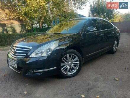 Черный Ниссан Теана, объемом двигателя 2.5 л и пробегом 201 тыс. км за 7950 $, фото 1 на Automoto.ua