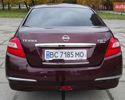 Червоний Ніссан Теана, об'ємом двигуна 2.5 л та пробігом 222 тис. км за 8100 $, фото 2 на Automoto.ua