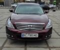 Красный Ниссан Теана, объемом двигателя 2.5 л и пробегом 231 тыс. км за 7000 $, фото 1 на Automoto.ua