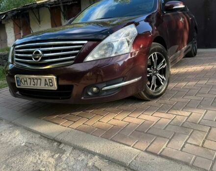 Красный Ниссан Теана, объемом двигателя 2.5 л и пробегом 223 тыс. км за 7950 $, фото 1 на Automoto.ua