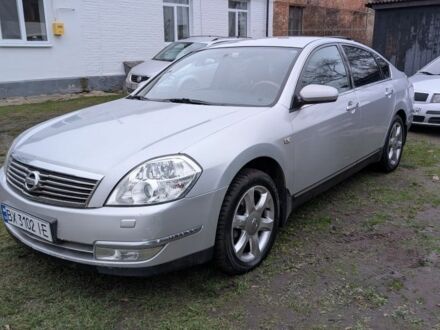 Серый Ниссан Теана, объемом двигателя 3.5 л и пробегом 323 тыс. км за 4000 $, фото 1 на Automoto.ua