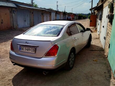 Серый Ниссан Теана, объемом двигателя 2.3 л и пробегом 280 тыс. км за 5000 $, фото 1 на Automoto.ua