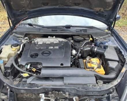 Синий Ниссан Теана, объемом двигателя 3.5 л и пробегом 205 тыс. км за 5000 $, фото 10 на Automoto.ua